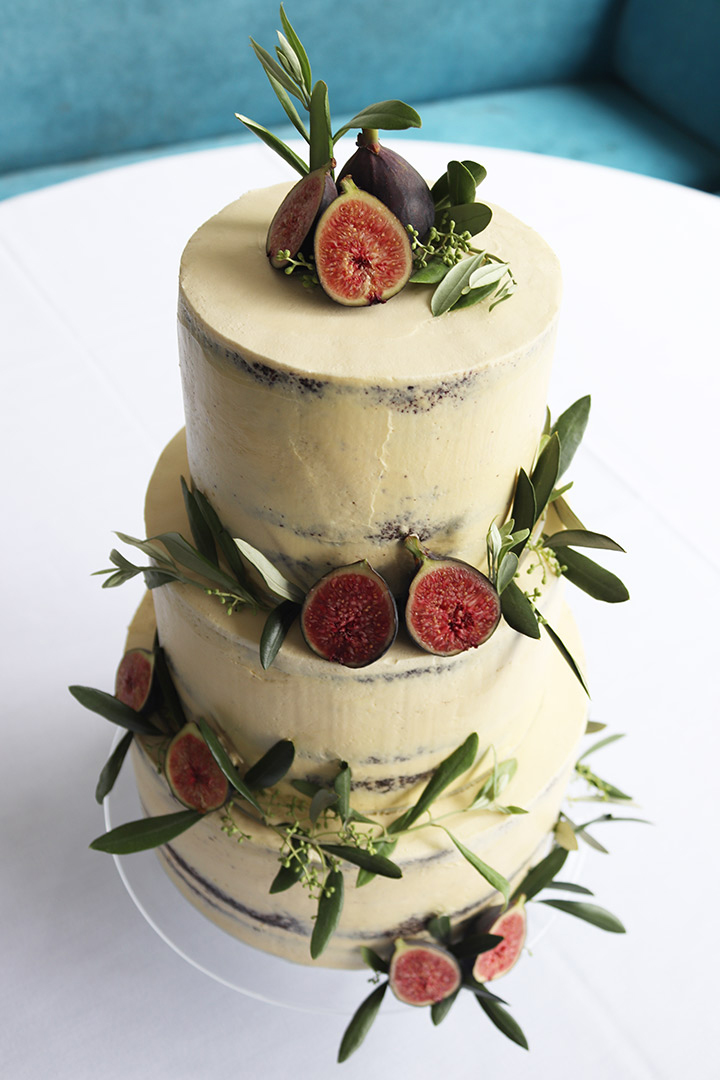Gluten-free, dairy-free Chocolate & Olive Oil Wedding Cake, decorated with fresh figs and olive sprigs. All ingredients glutenfree, dairyfree, milkfree