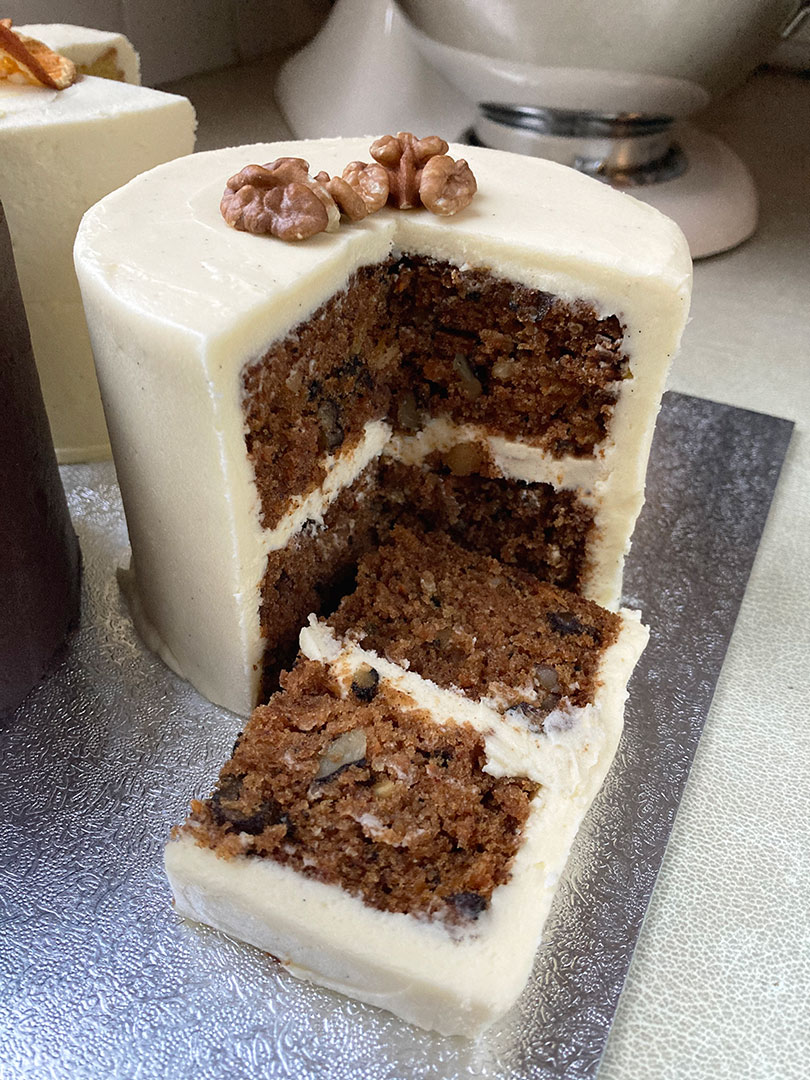 Gluten free, dairy free layer cake, made with grated organic carrot and crunchy organic walnut chunks. Filled and frosted with silky dairy-free cream cheese buttercream. Various decorations available. All ingredients glutenfree and dairyfree