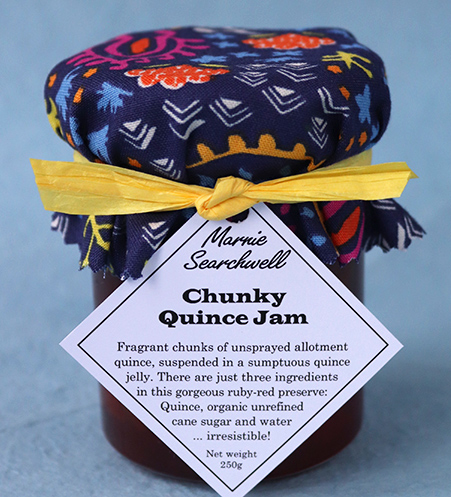 Fragrant chunks of quince fruit set in a gorgeous, deep-red quince jelly – a fabulous jam!
