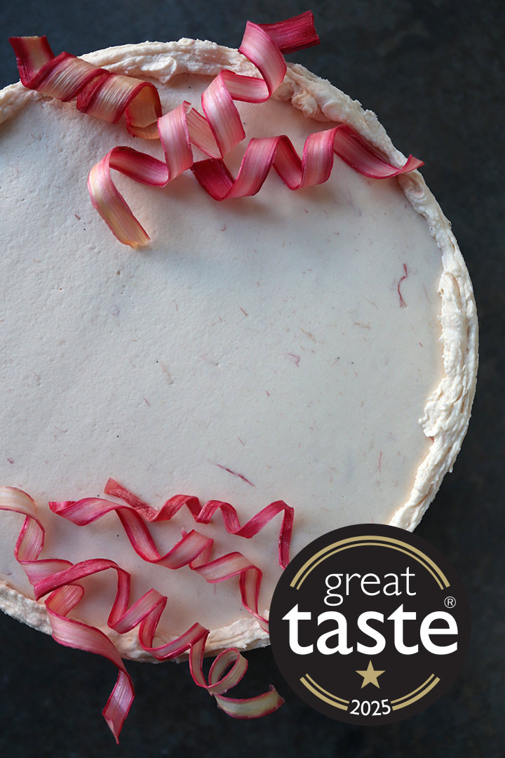 A tender, moist white chocolate cake, made with buttermilk and organic white chocolate, and layered with vanilla-roasted rhubarb. All ingredients gluten-free