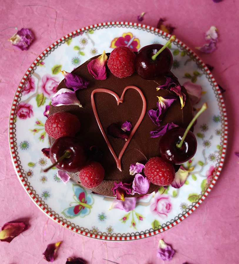 Great Taste award-winning gluten-free chocolate and almond cake. Made with organic dark chocolate & ground almonds, and Appleton Jamaica Rum, with a dash of almond extract. Contains almonds, all ingredients gluten free. Covered in dark chocolate ganache. Can be decorated. Delivery in London, can be posted